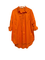 Le îls orange shirt