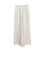 Le îls white pants