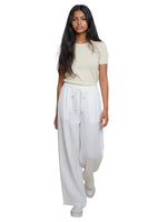 Le îls white pants